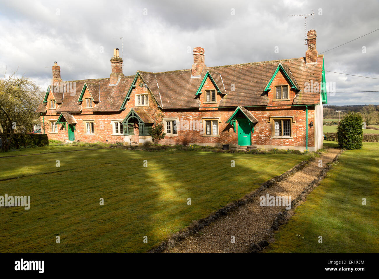 Traditional rural cottages in small terrace, Compton Bassett, Wiltshire, England, UK Stock Photo