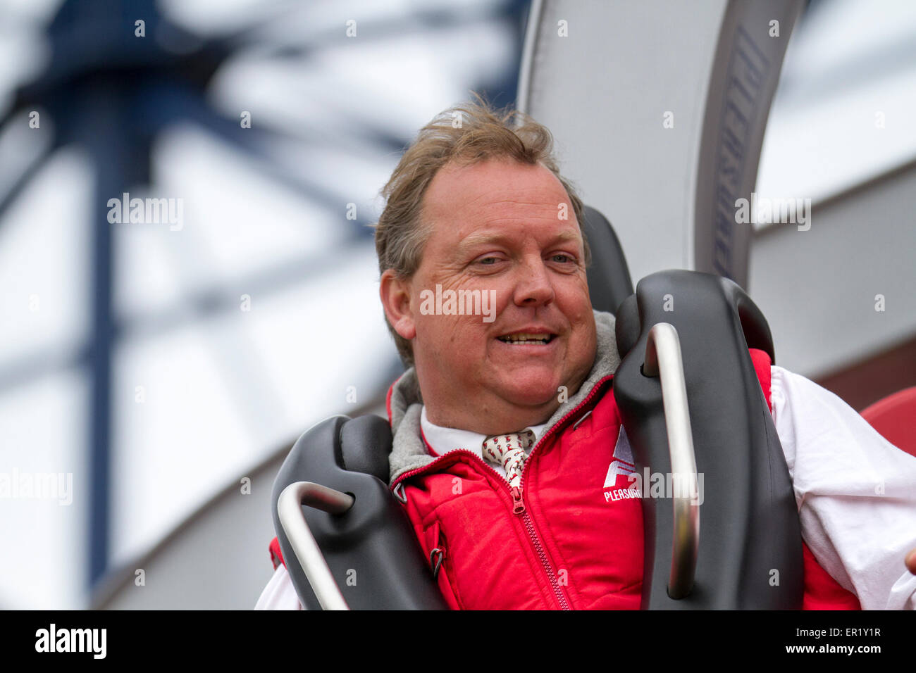 Blackpool, Lancashire, UK. 25th May, 2015. Red Arrow SkyForce Opens.   Nick Thompson Deputy Managing Director at the launch of the new ride, complete in Red Arrows livery is a new airborne adventure and display. The 72 ft white-knuckle ride allows riders to spin glide, and swirl as pilots take control of their own aeroplane in formation. Stock Photo
