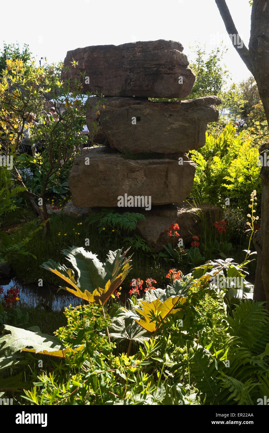 Chelsea Flower Show 2015 Dan Pearson's Rock Garden / Trout Stream for Laurent-Perrier / Chatsworth. Stacked Rocks with Foliage. Stock Photo