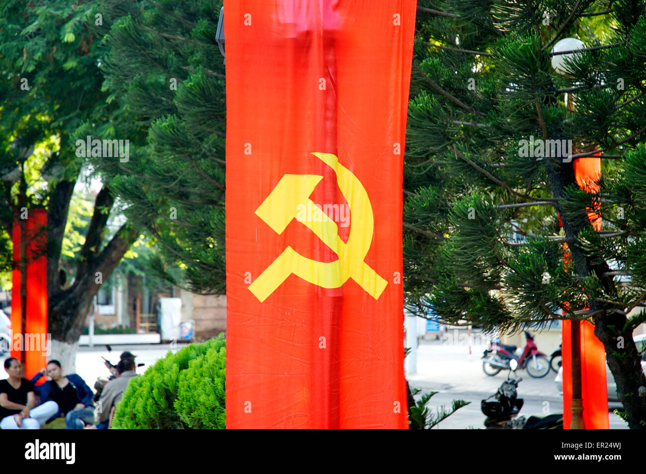 Communist Party hammer and sickle banner hanging in Nha Trang memorial  gardens, Vietnam Stock Photo - Alamy