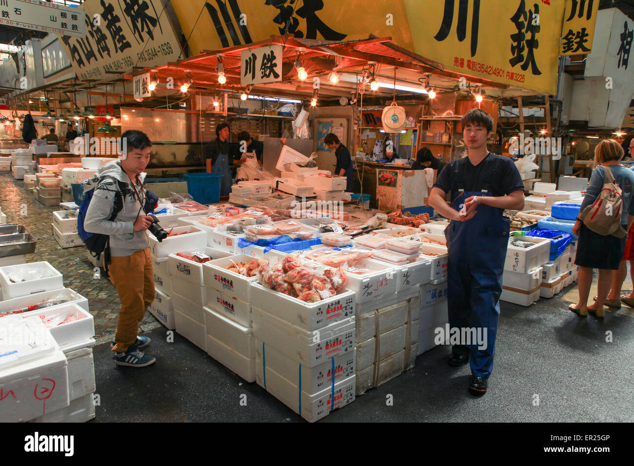 Famous Tsukiji fish market shops. Tsukiji is the biggest fish market in the world, with a vast varaiety of Fish and sea food Stock Photo