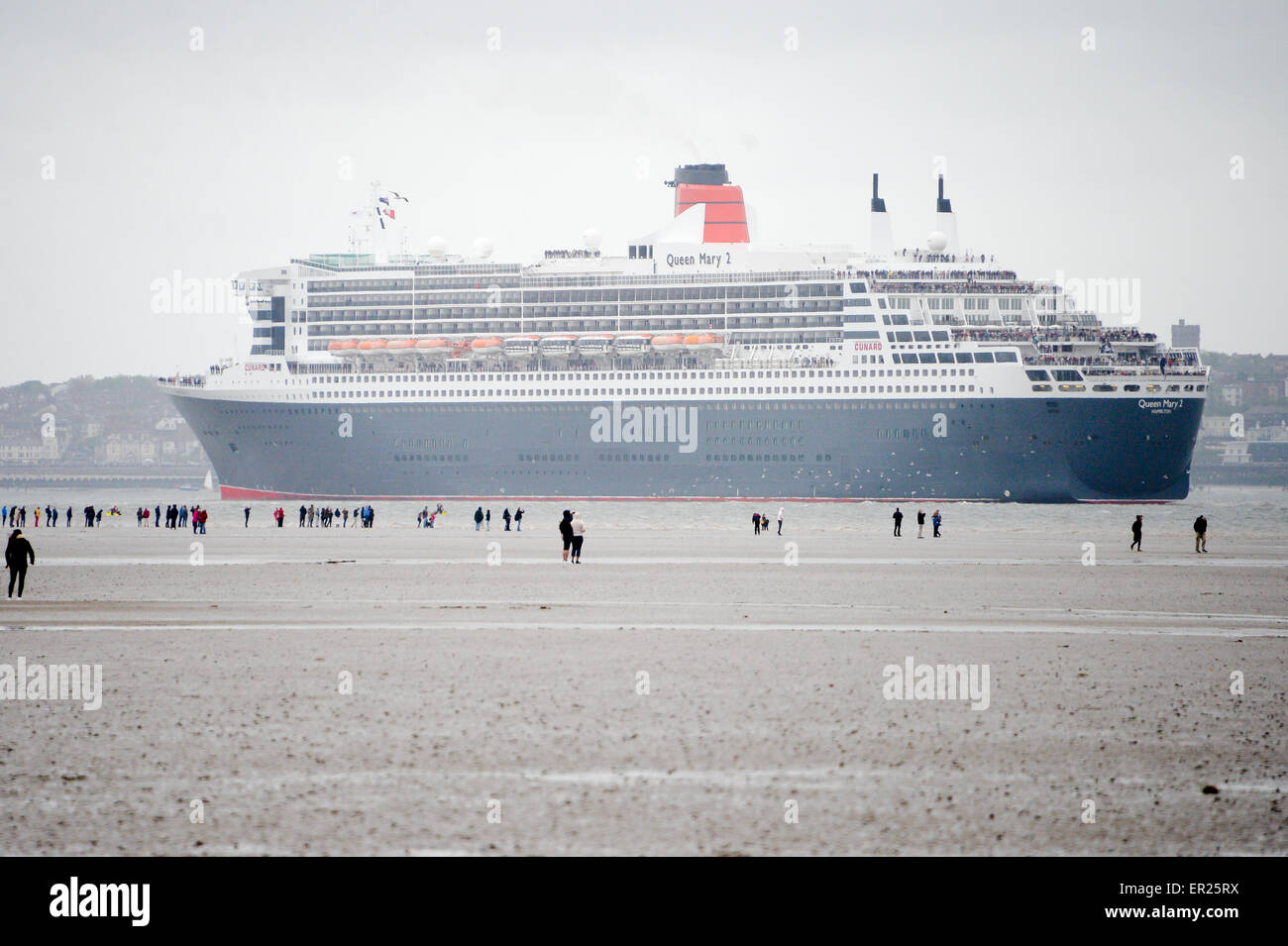 Liverpool, UK. 25th May, 2015. Cunard Line's Three Queens Meeting Liverpool.  Crosby Beach 25.5.15. Queen Mary 2 viewed from Crosby Beach on the way to meet up with Queen Victoria and Queen Elizabeth. Credit:  ALAN EDWARDS/Alamy Live News Stock Photo