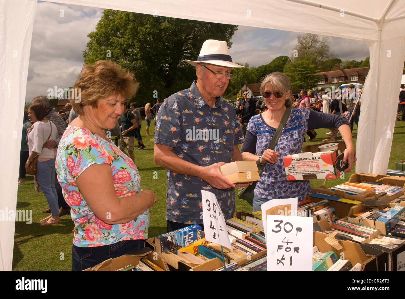 People browsing a book stall at Fernhurst Revels annual fair, Fernhurst