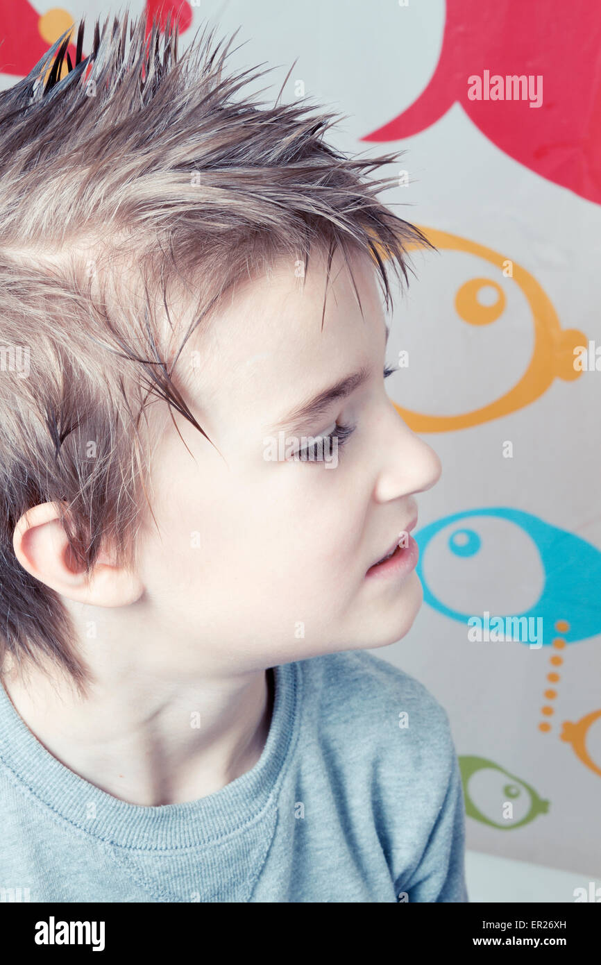 boy 8 years hairstyle spiky hair Stock Photo