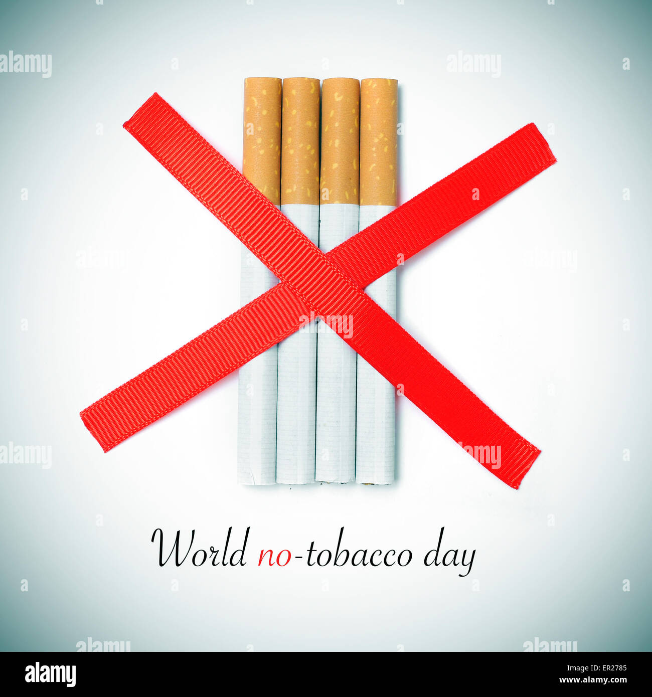 The Text World No Tobacco Day And Some Cigarettes Crossed By Two Red Slashes On A White Background With A Slight Vignette Added Stock Photo Alamy