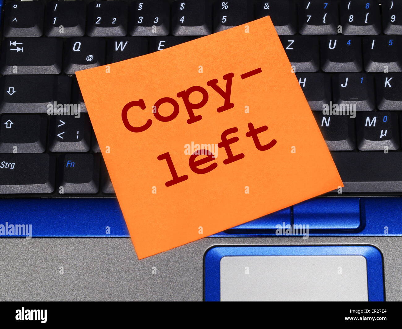 Memo note on notebook, copyleft Stock Photo Alamy