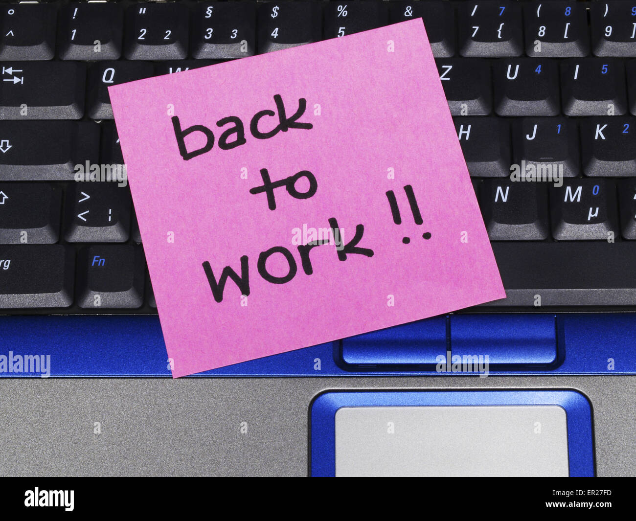 Memo note on notebook, back to work Stock Photo - Alamy