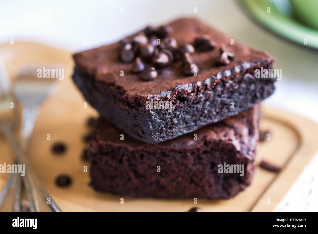 Homemade Brownies with chocolate chip by a cup of coffee Stock Photo