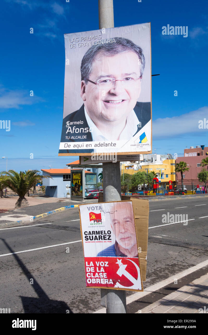 Las Palmas, Gran Canaria, Canary Islands, Spain. 25th May, 2015. Campaig poster for the Canarian Coalition party (top) who, following Sunday`s municipal and regional elections, are now the largest party in the local Gran Canaria parliament with 18 seats, six more than the conservative PP (Popular Party), who saw their municipal and regional powers eroded across much of Spain in Sunday`s elections Credit:  ALANDAWSONPHOTOGRAPHY/Alamy Live News Stock Photo