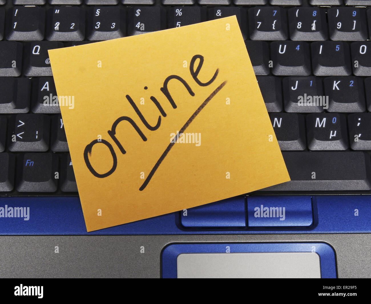 Memo note on notebook, online Stock Photo Alamy