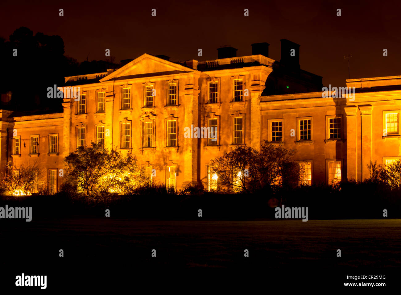 Night scene of Himley Hall illuminated at Himley Hall Park, Dudley, West Midlands. Once ancestral home of the Earl of Dudley. Stock Photo