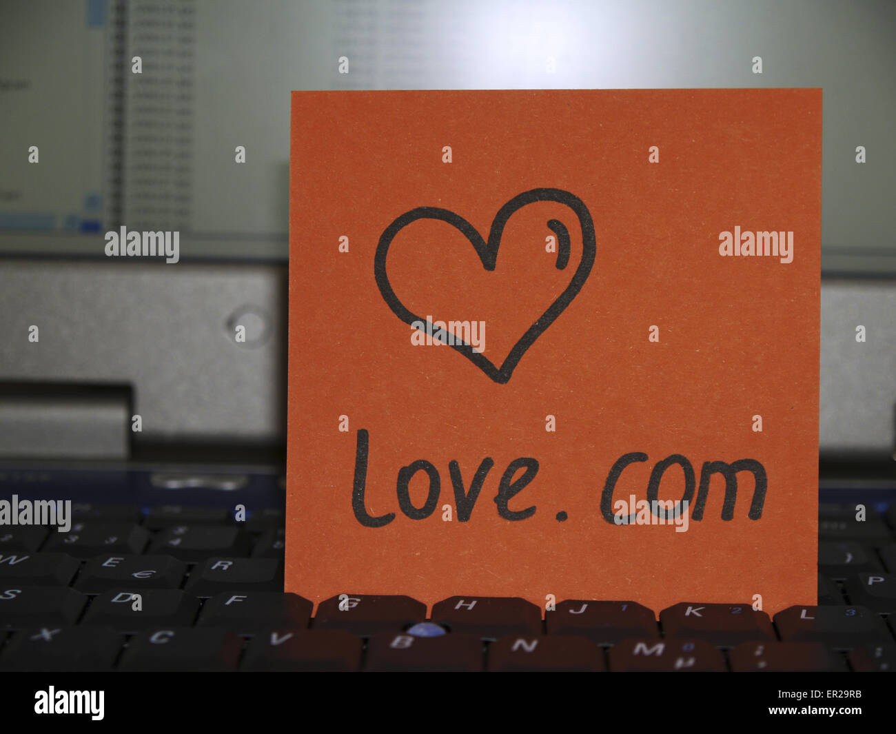 Memo note on notebook, drawing of heart, love.com Stock Photo - Alamy