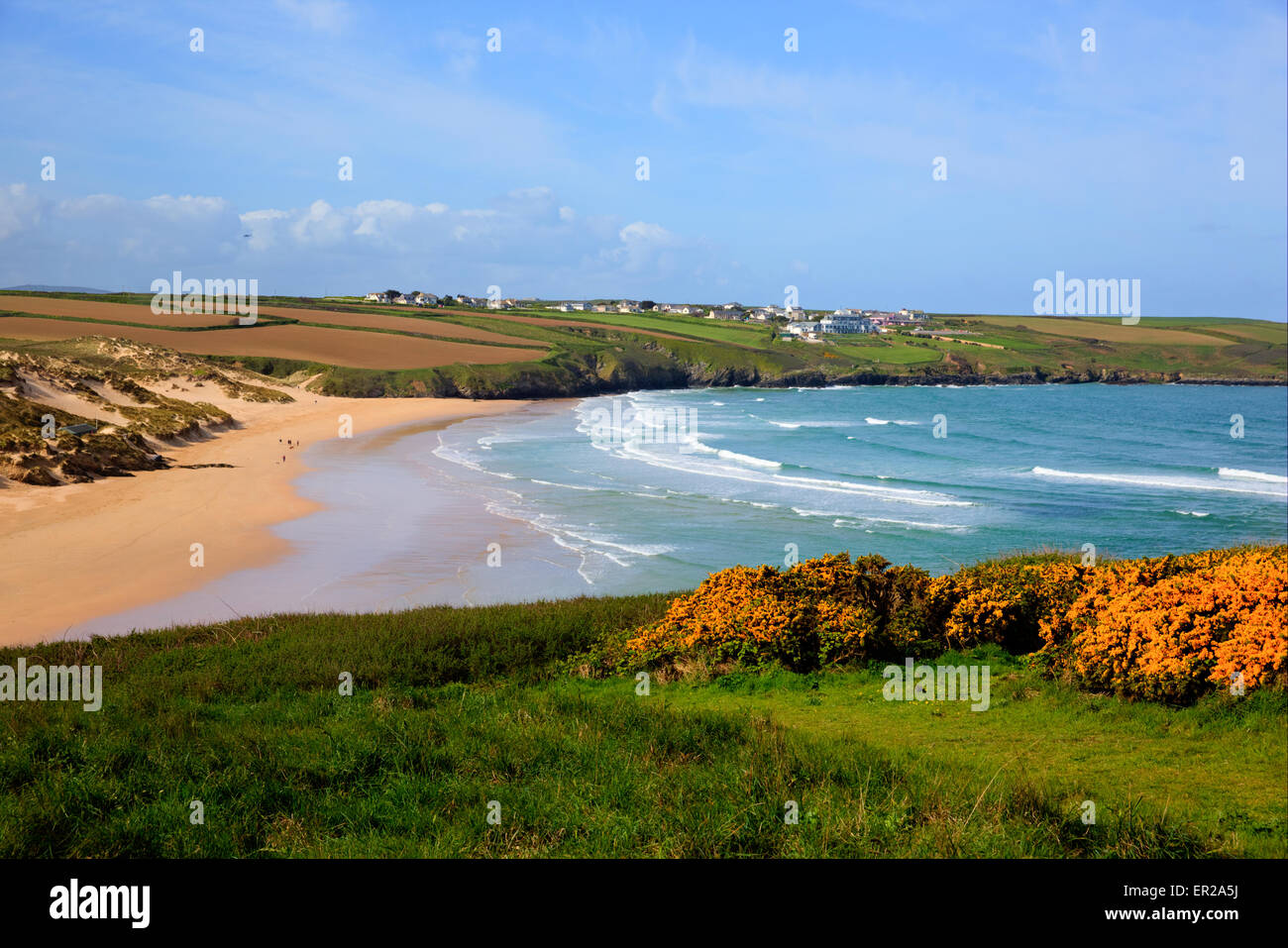 Crantock bay and beach North Cornwall England UK near Newquay with waves and blue sky and sea in spring Stock Photo