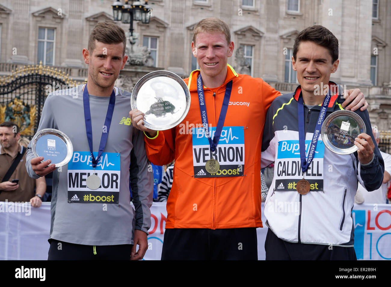 London, UK. 25th May, 2015. Men winner Jonny Mellor, Andy Vernon and Luke Caldwell of the 2015 Bupa London 10,000 at Westminster in London. Credit:  See Li/Alamy Live News Stock Photo