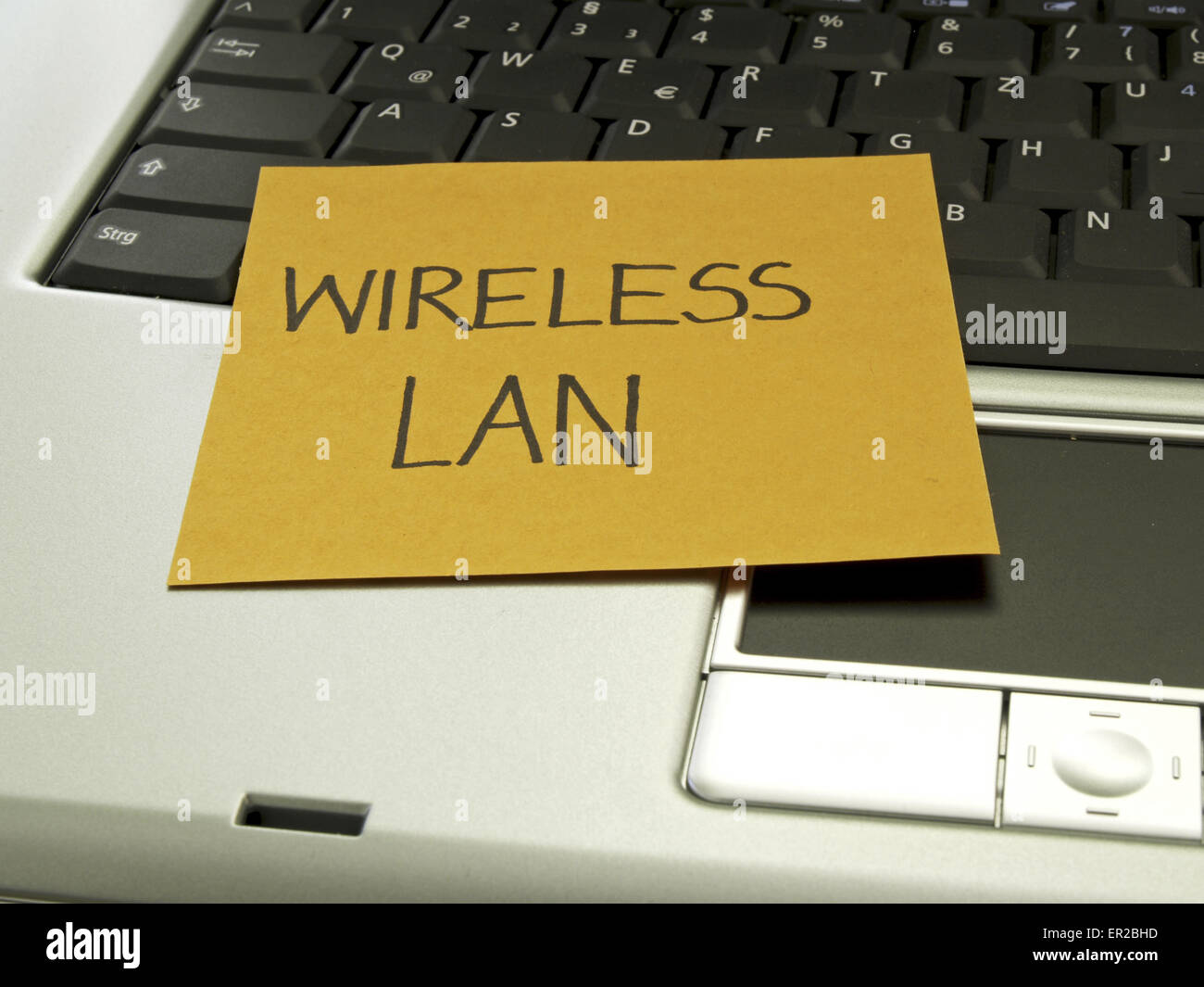 Memo note on notebook, wireless LAN Stock Photo Alamy
