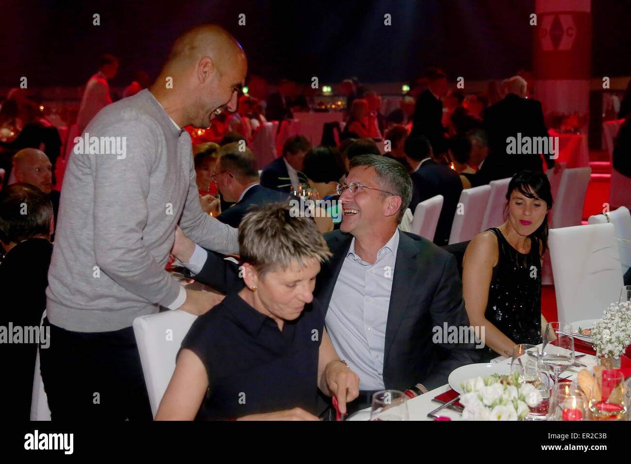 Munich, Germany. 23rd May, 2015.  Josep Guardiola, head coach of Bayern Muenchen talks to Herbert Hainer, CEO of adidas group during the FC Bayern Muenchen Bundesliga Champions Dinner at Postpalast on May 23, 2015 in Munich, Germany. Credit:  kolvenbach/Alamy Live News Stock Photo