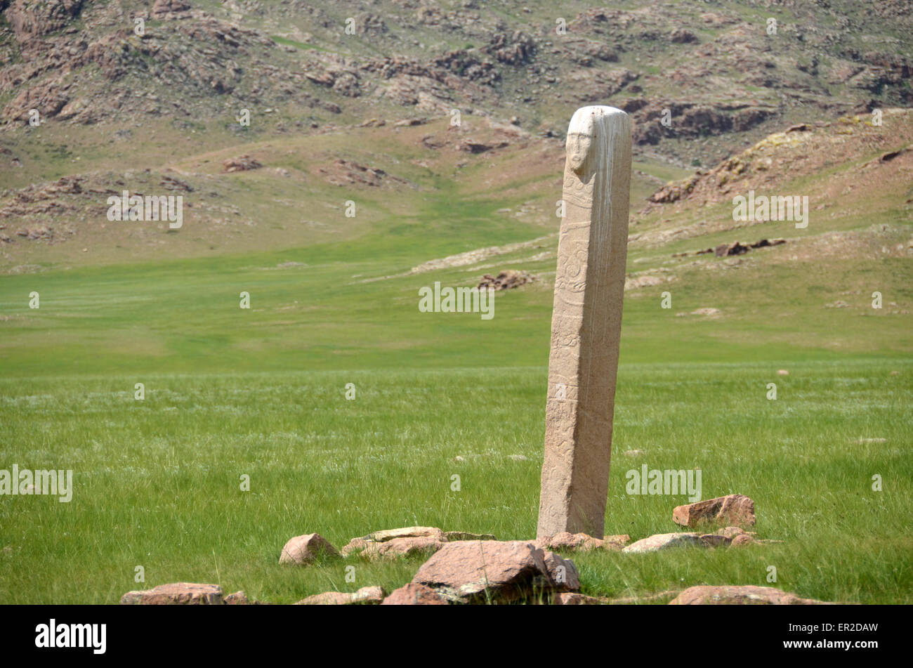 Deer stone with a human face near the city of Moron, Ovsgol province, northern Mongolia. Stock Photo