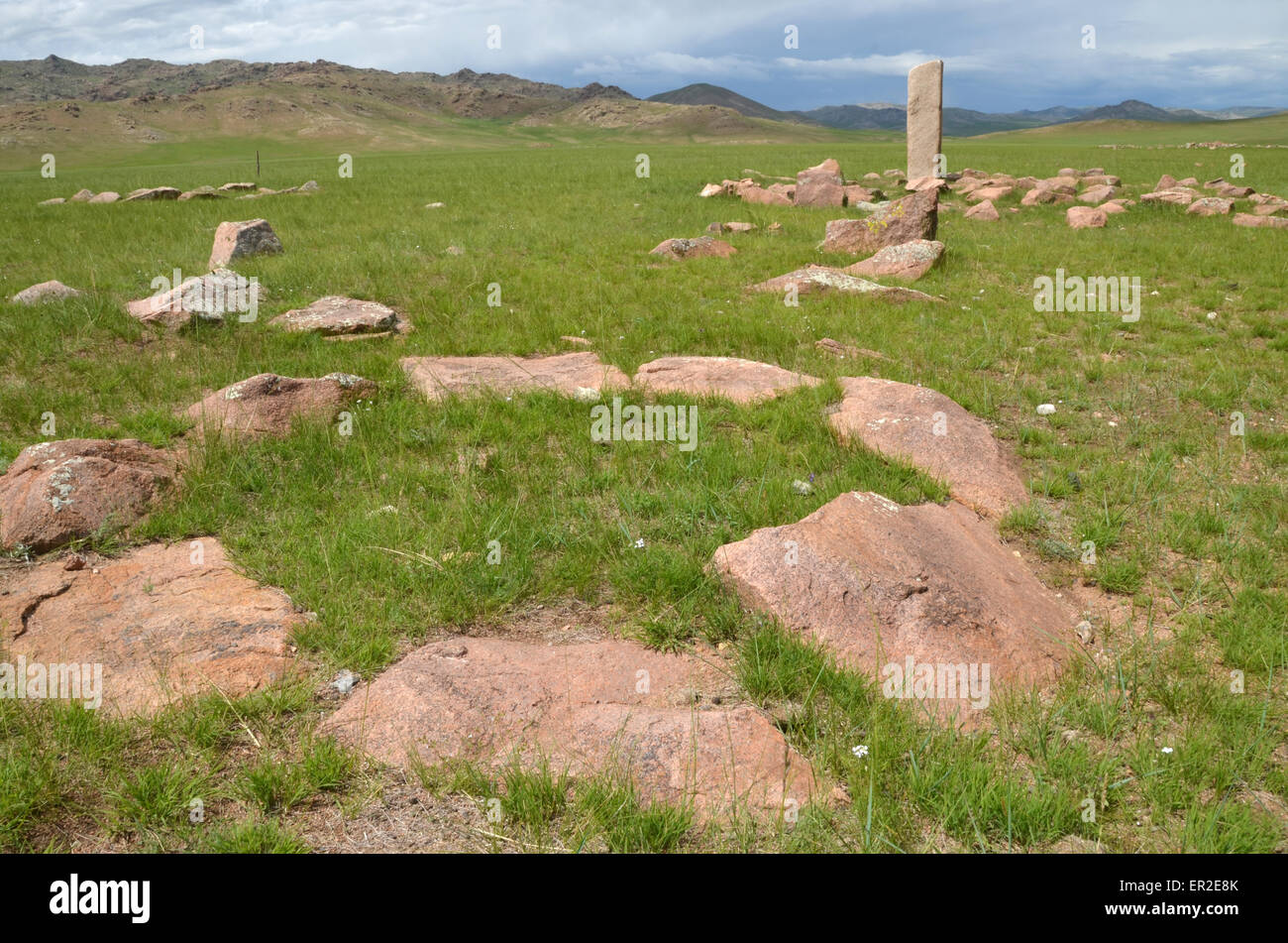 Burial mounds and deer stone near the city of Moron, Ovsgol province, northern Mongolia. Stock Photo