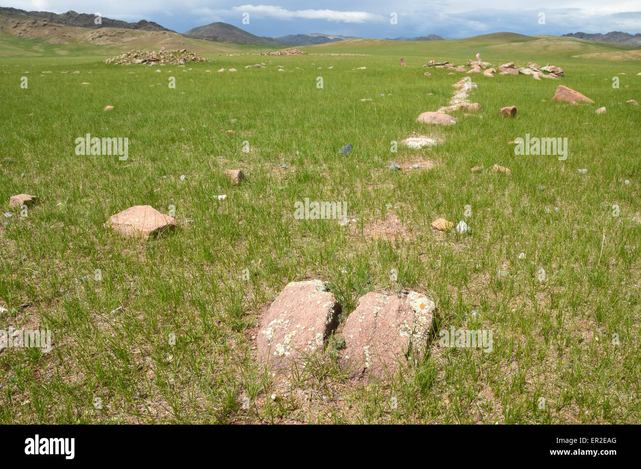 Burial mounds and stone alignment near the city of Moron, Ovsgol province, northern Mongolia. Stock Photo
