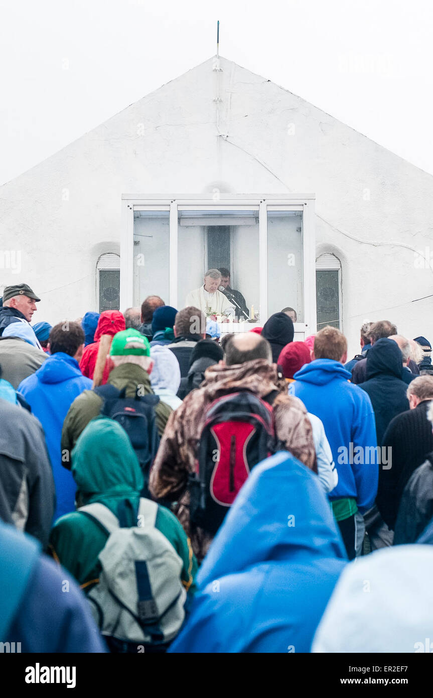 Pilgrims gather for mass at St. Patrick's church, at the top of Croagh Patrick, Ireland Stock Photo