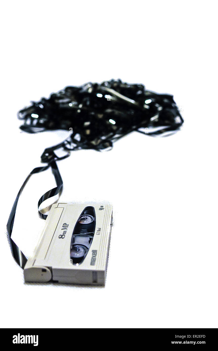 8mm video tape pulled from its cassette Stock Photo Alamy