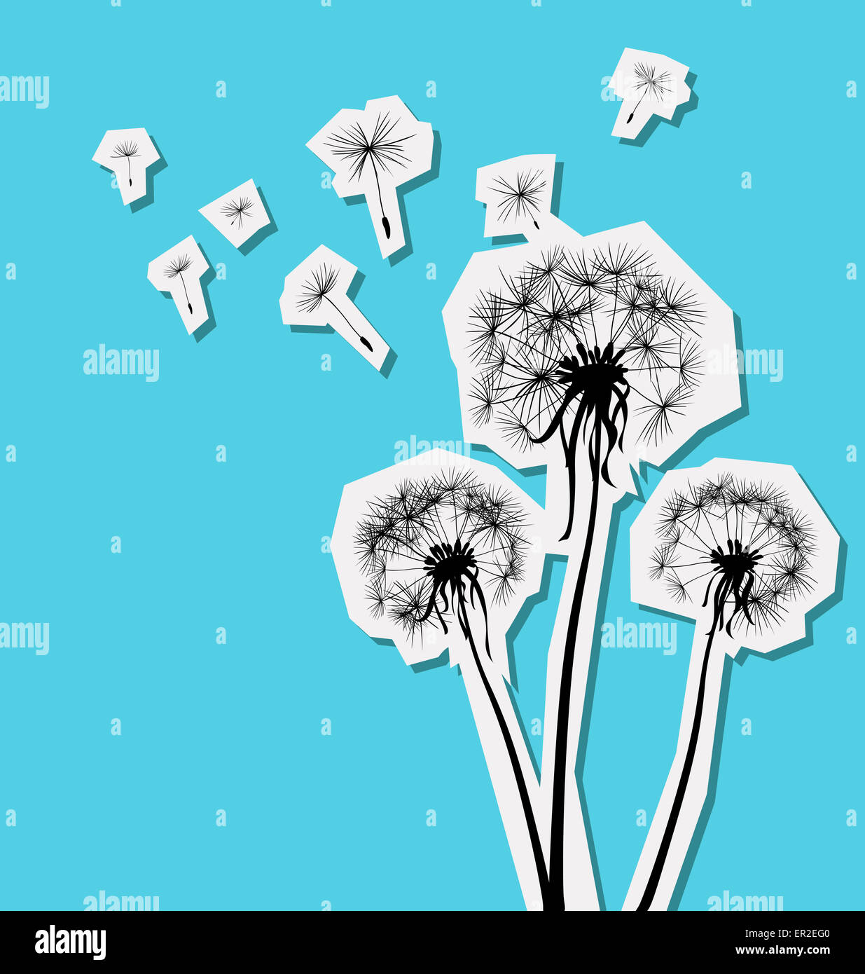 silhouettes of three dandelions in the wind Stock Photo