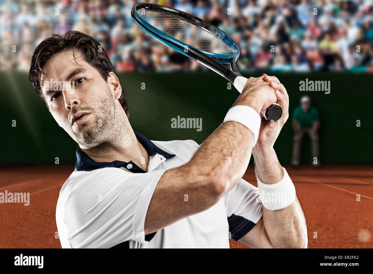 Tennis player playing on a clay tennis court Stock Photo Alamy