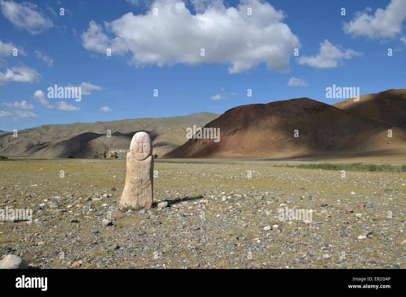 Balbal and funeral mounds in western Mongolia, west of Olgii city, Bayan Olgii province. Balbals are antic standing stones. Stock Photo