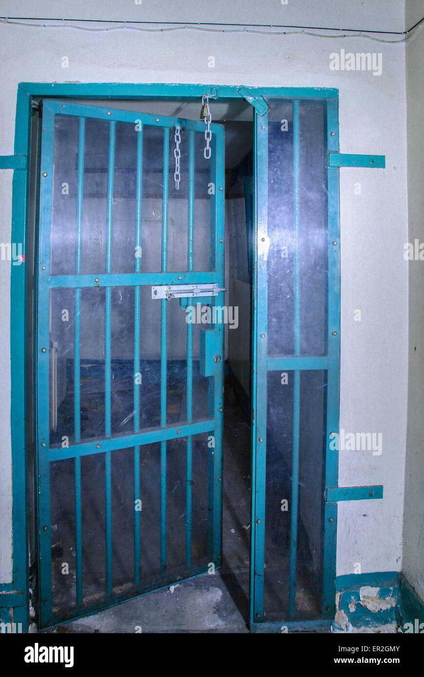 Blue metal door, open, inside a prison Stock Photo