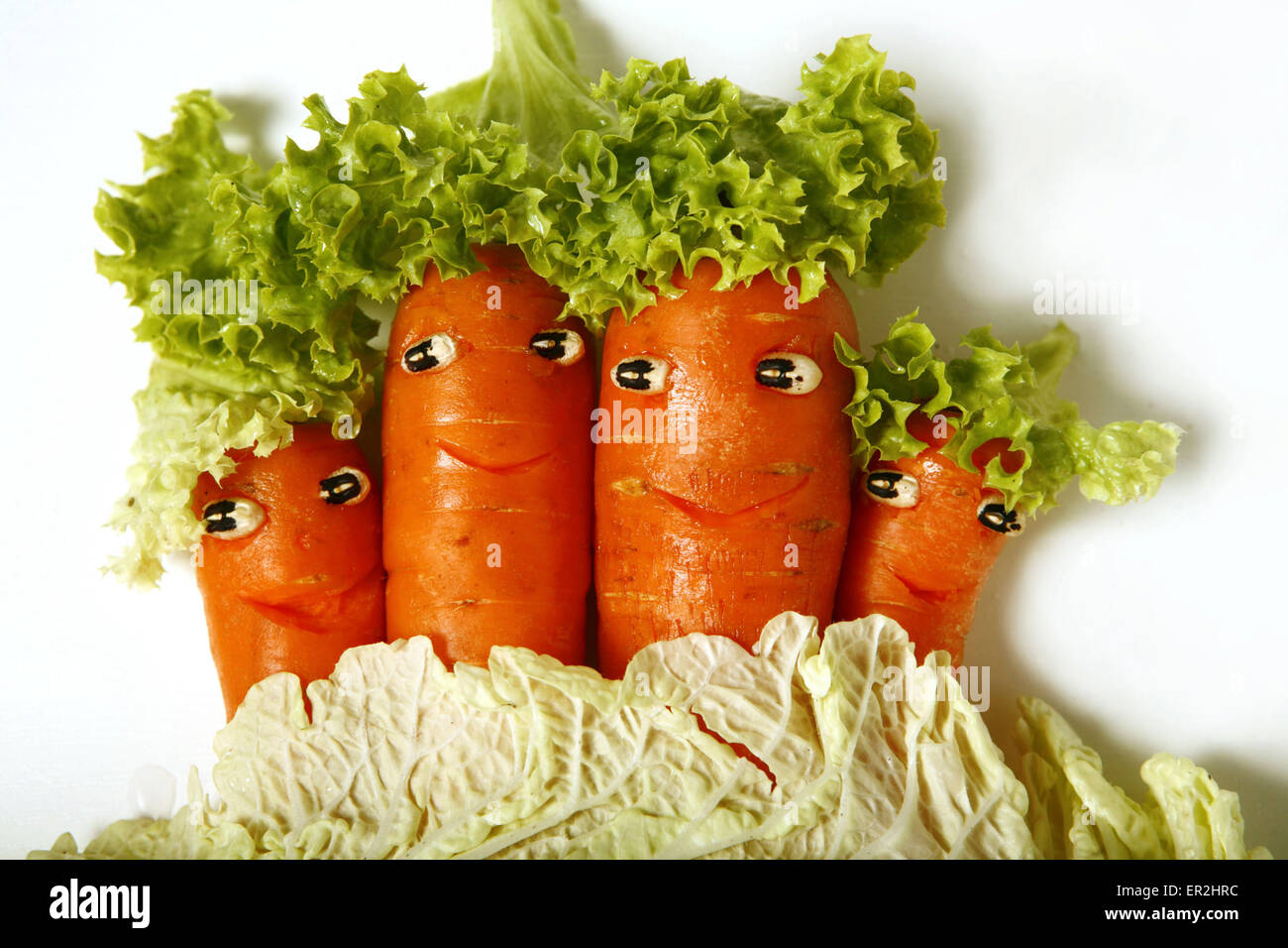 Symbol, Gemuese, Gesicht, Gesichter, Froehlich, Vitamine, Gesund, Grinsen, Moehren, Karotten Stock Photo