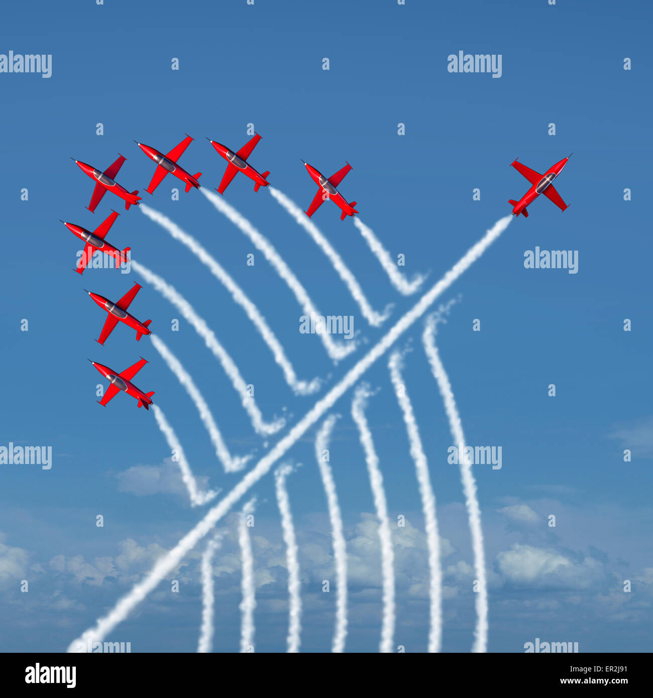 Disruptive innovation Independent leadership concept and individuality as a group of acrobatic jets with one individual jet going in the opposite direction as a business symbol for new thinking and attitude as a different nonconformist maverick. Stock Photo