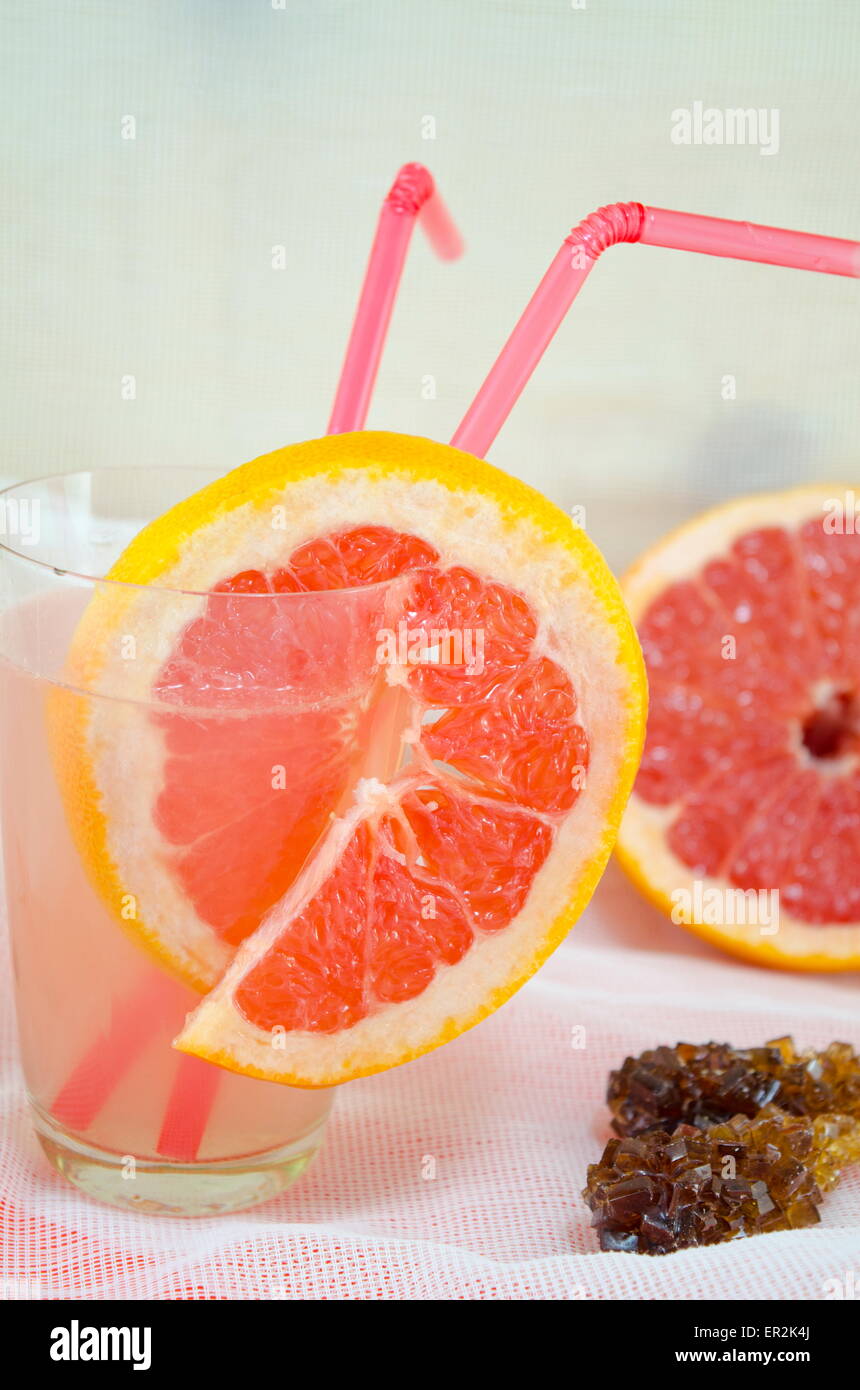 Fresh grapefruit juice in a glass decorated with red grapefruit slice Stock Photo