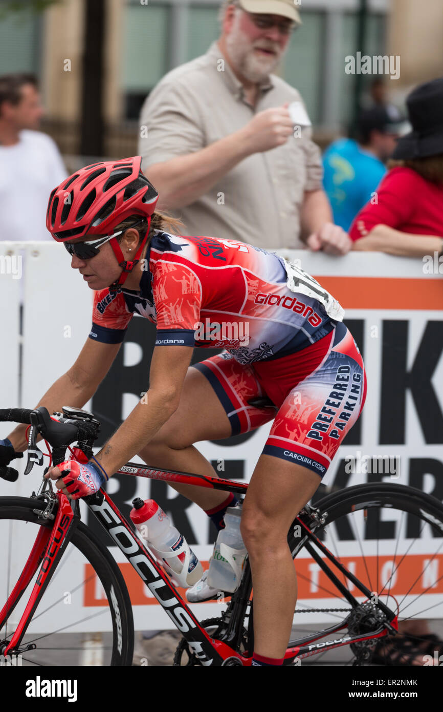 Chattanooga, Tennessee, USA.  25th May, 2015. Professional cyclist crosses the finish line in the 2015 USA Cycling National Championship Road Race (Female Pro) event, held in the streets of Chattanooga, Tennessee, USA. Credit:  TDP Photography/Alamy Live News Stock Photo