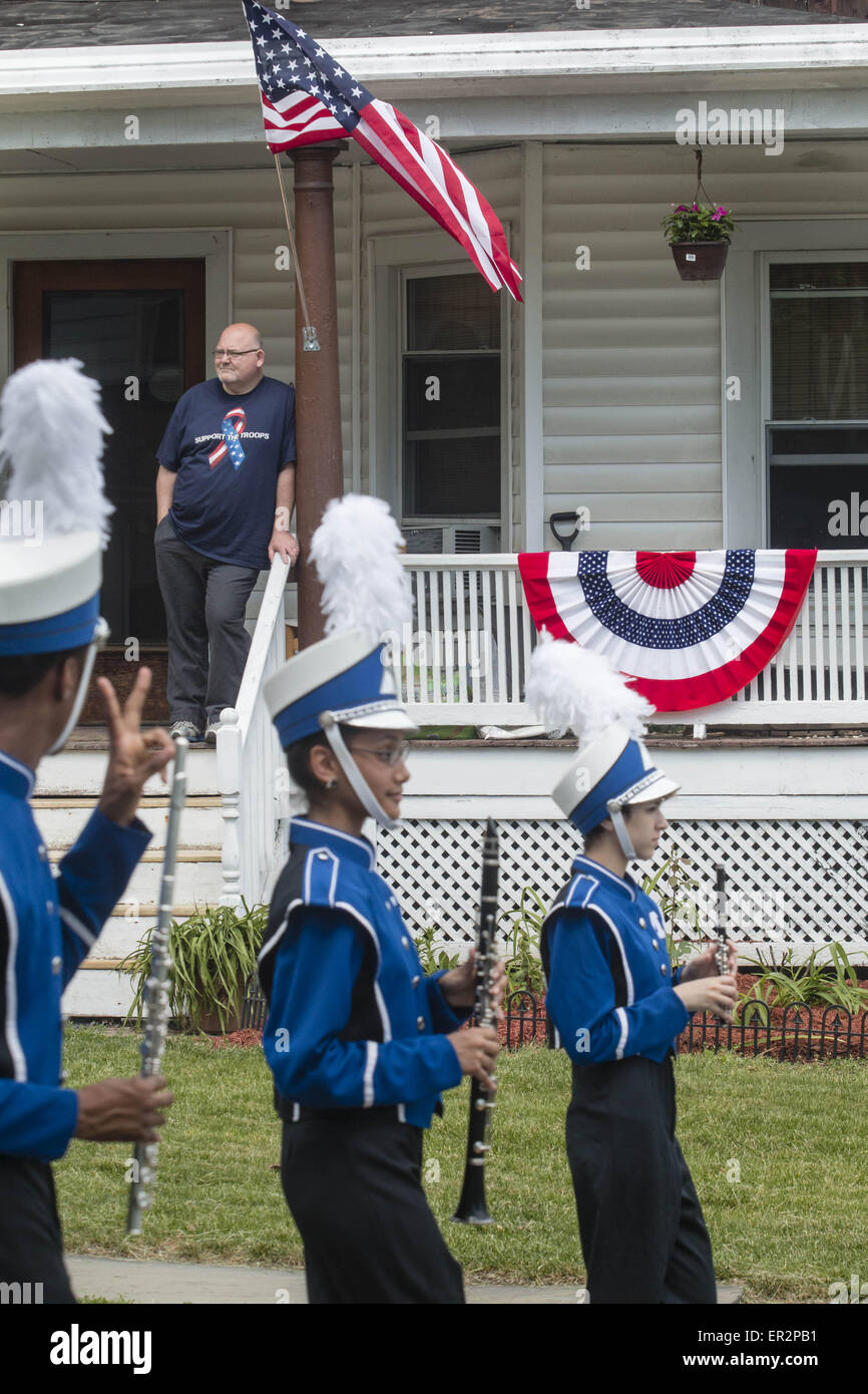 Middletown, N.Y, USA. 25th May, 2015. A man watches from his porch as ...