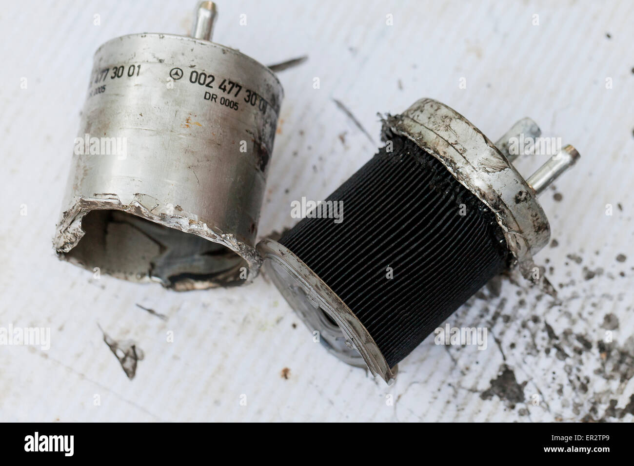 Dirty fuel filter removed from car - USA Stock Photo