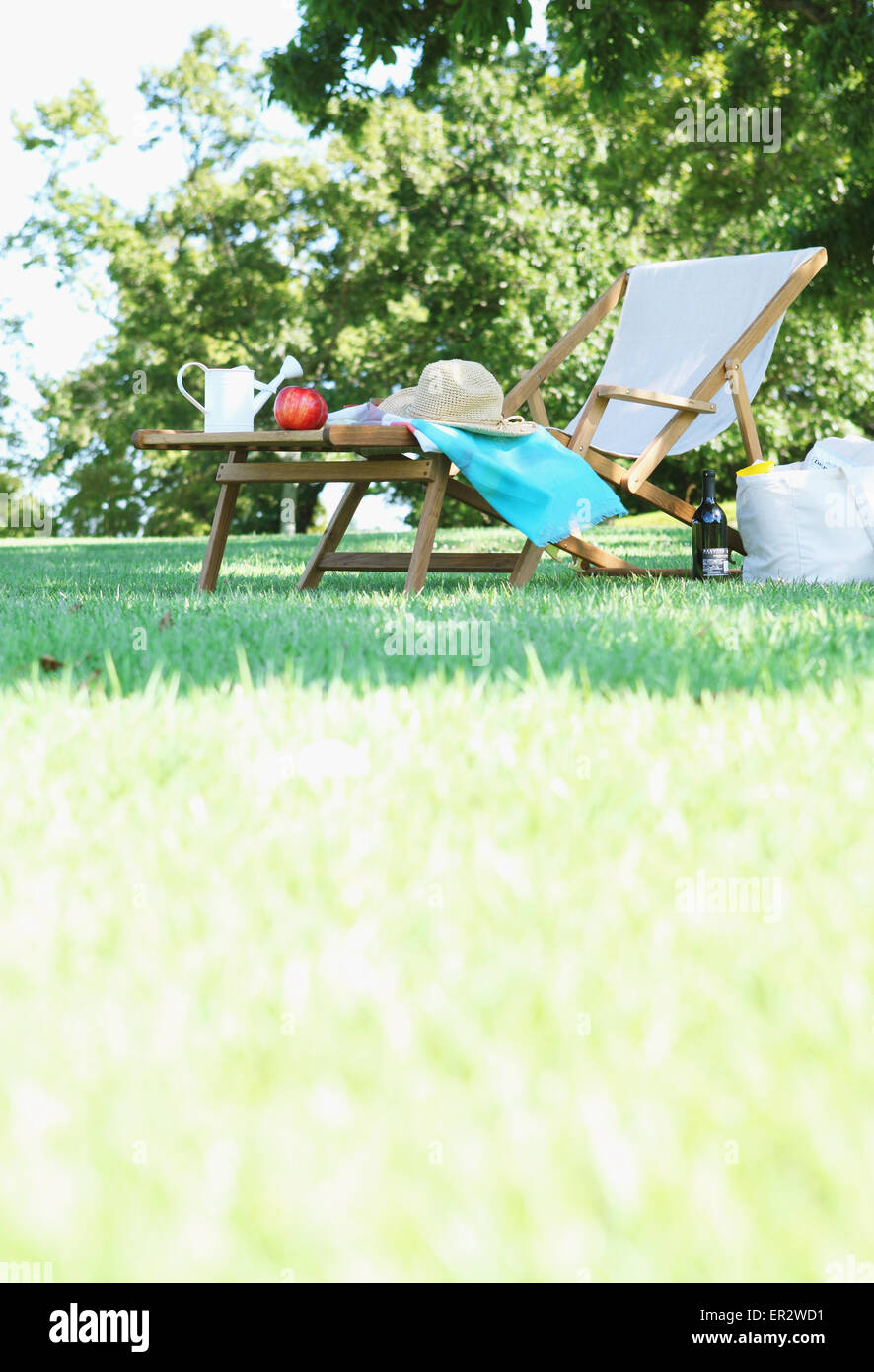 Deck chair in a city park Stock Photo - Alamy
