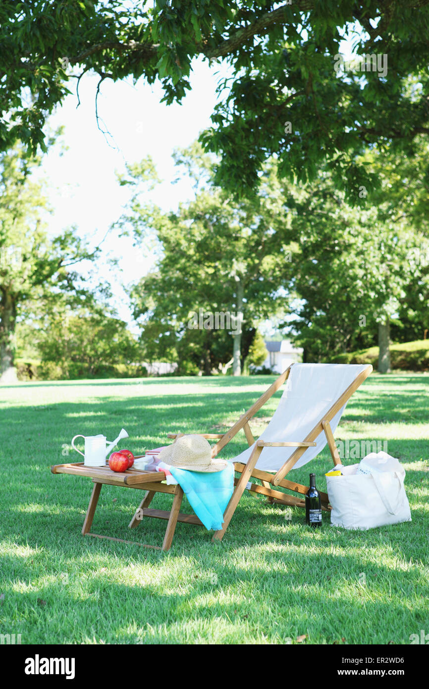 Deck chair in a city park Stock Photo - Alamy