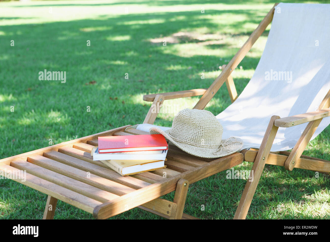 Deck chair in a city park Stock Photo - Alamy