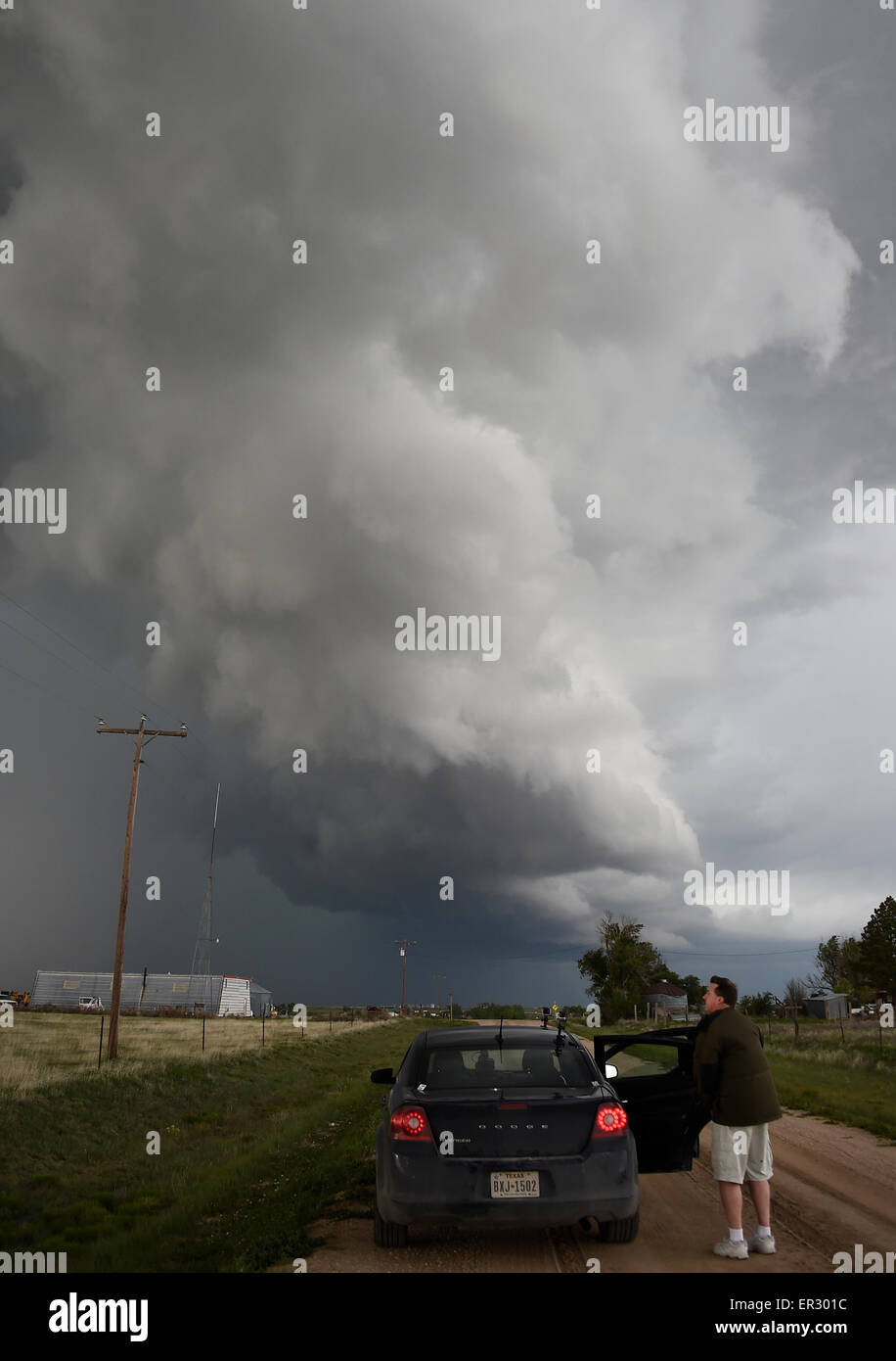 May 24, 2015. Springfield CO. Storm chaser Brad Mack watches a wall cloud from from large tornado warren super cells that set a new record of 14,000   lighting strikes per hour Sunday. The weekend storms in the states of Texas and Oklahoma have killed three people, 12 are still missing and over 2000 people evacuated and 400  homes destroyed or damage in TX.Photo by Gene Blevins/LA DailyNews/ZumaPress. Credit:  Gene Blevins/ZUMA Wire/Alamy Live News Stock Photo