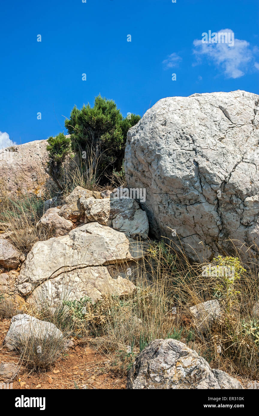 Russia, Crimea. Rocks, which snap into the sea near Balaklava. Hot ...