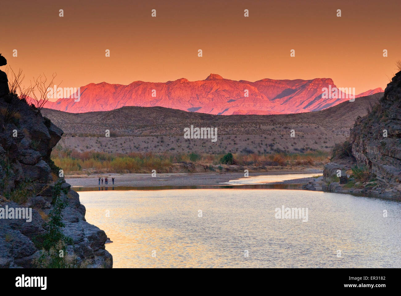 Chisos Mountains seen over Rio Grande from Santa Elena Canyon at sunset, Chihuahuan Desert in Big Bend National Park, Texas, USA Stock Photo
