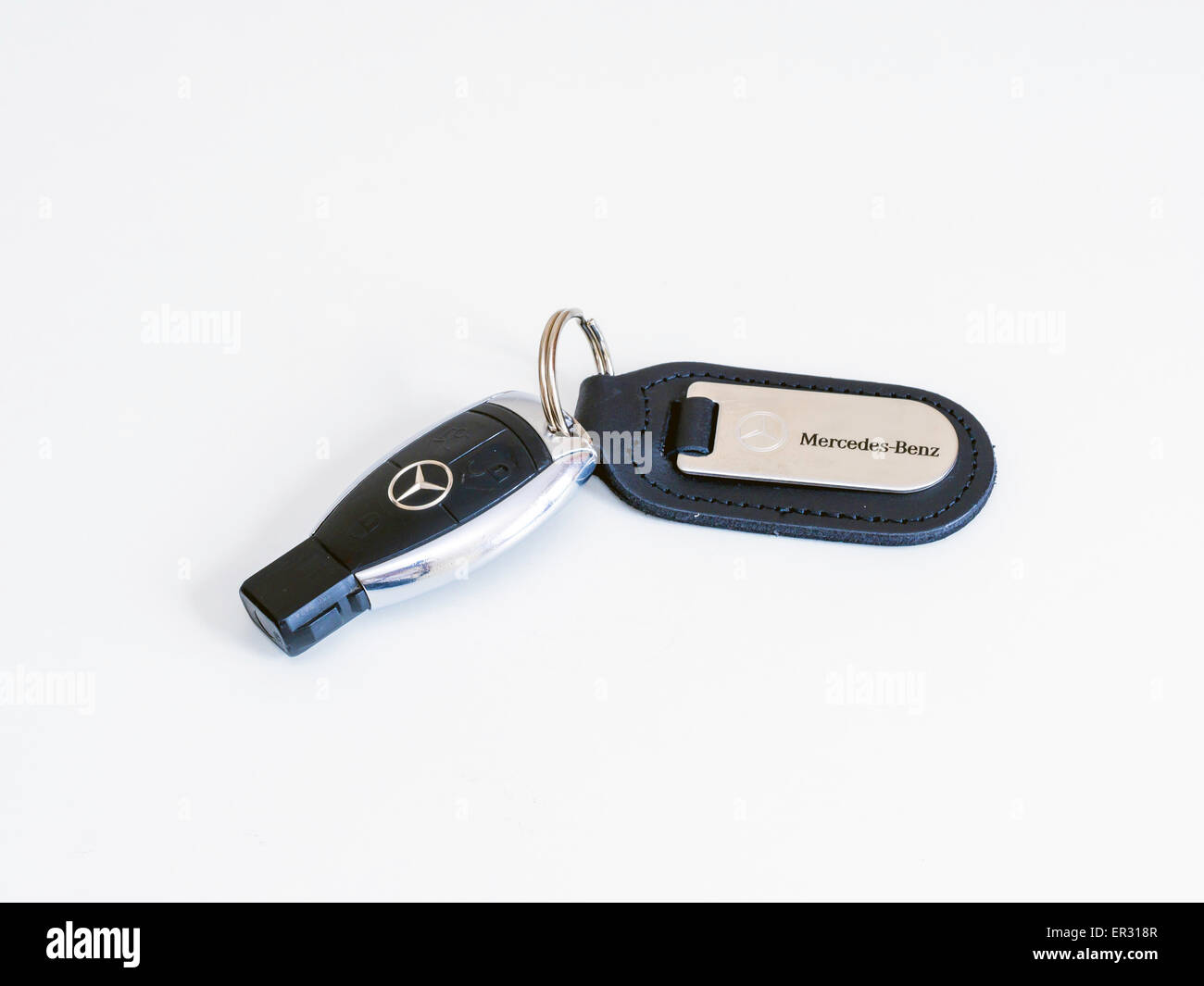 A Mercedes Benz luxury car key and fob Stock Photo