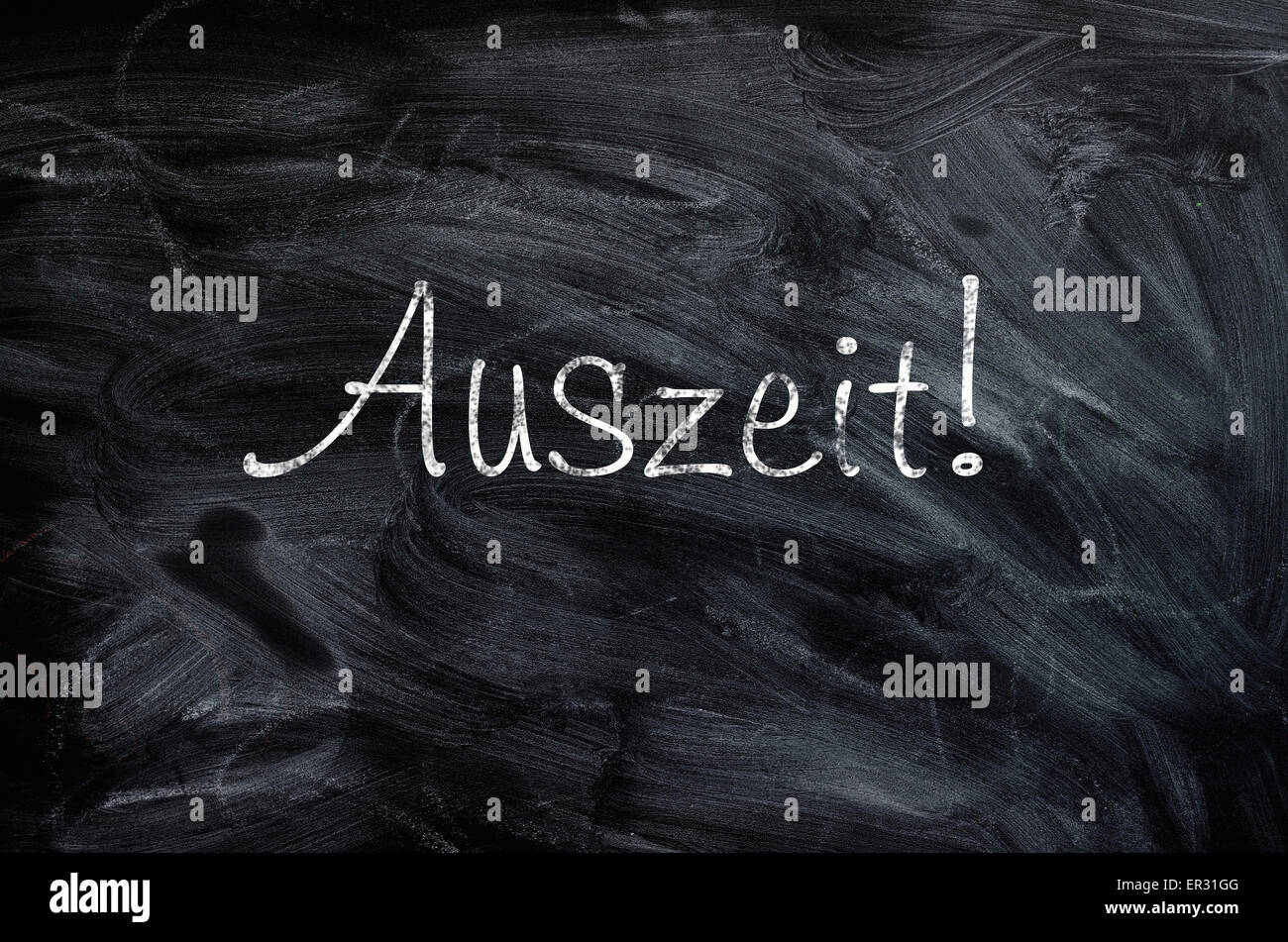 Blackboard with the German word Auszeit , Time out concept Stock Photo