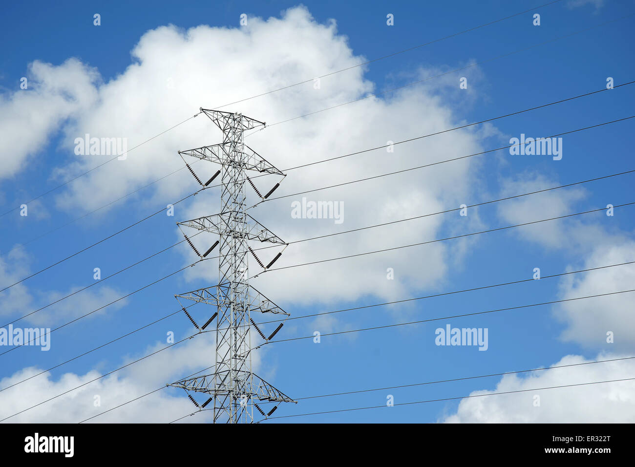 High voltage electric tower on sky background Stock Photo - Alamy