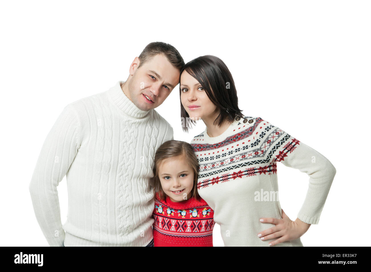 portrait of happy young family standing together isolated on white ...