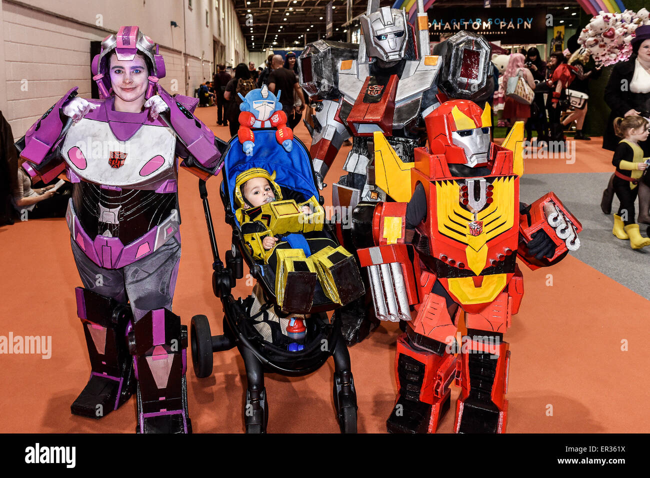 A family of cosplay enthusiasts attending the MCM London Comic Con at the Excel centre. Stock Photo