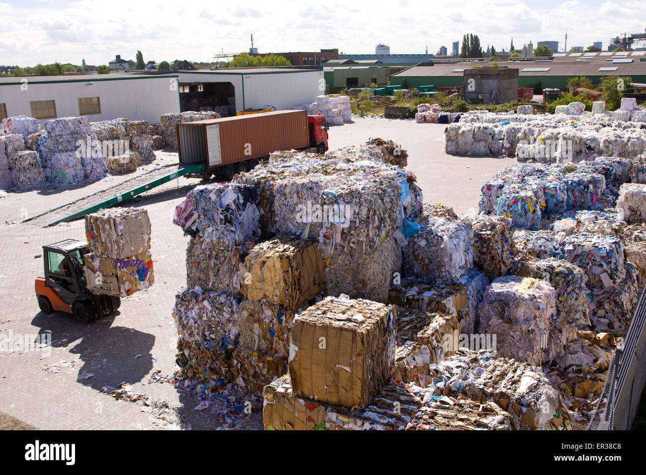 Europe, Germany, Ruhr Area, Dortmund, loading of recovered paper at a paper recycling company at the harbour Dortmund, loading o Stock Photo