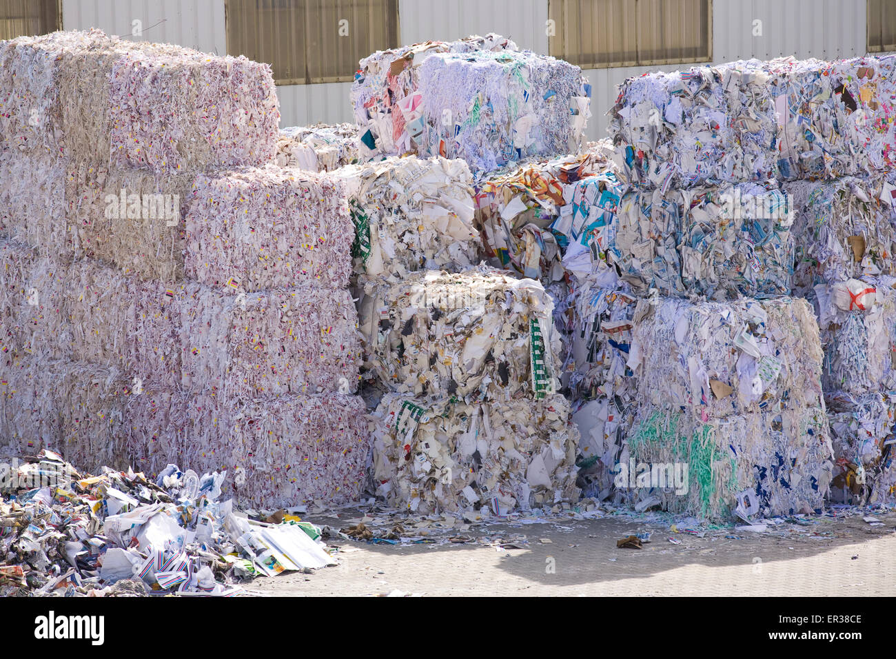 Europe, Germany, Ruhr Area, Dortmund, loading of recovered paper at a paper recycling company at the harbour Dortmund, bales of  Stock Photo