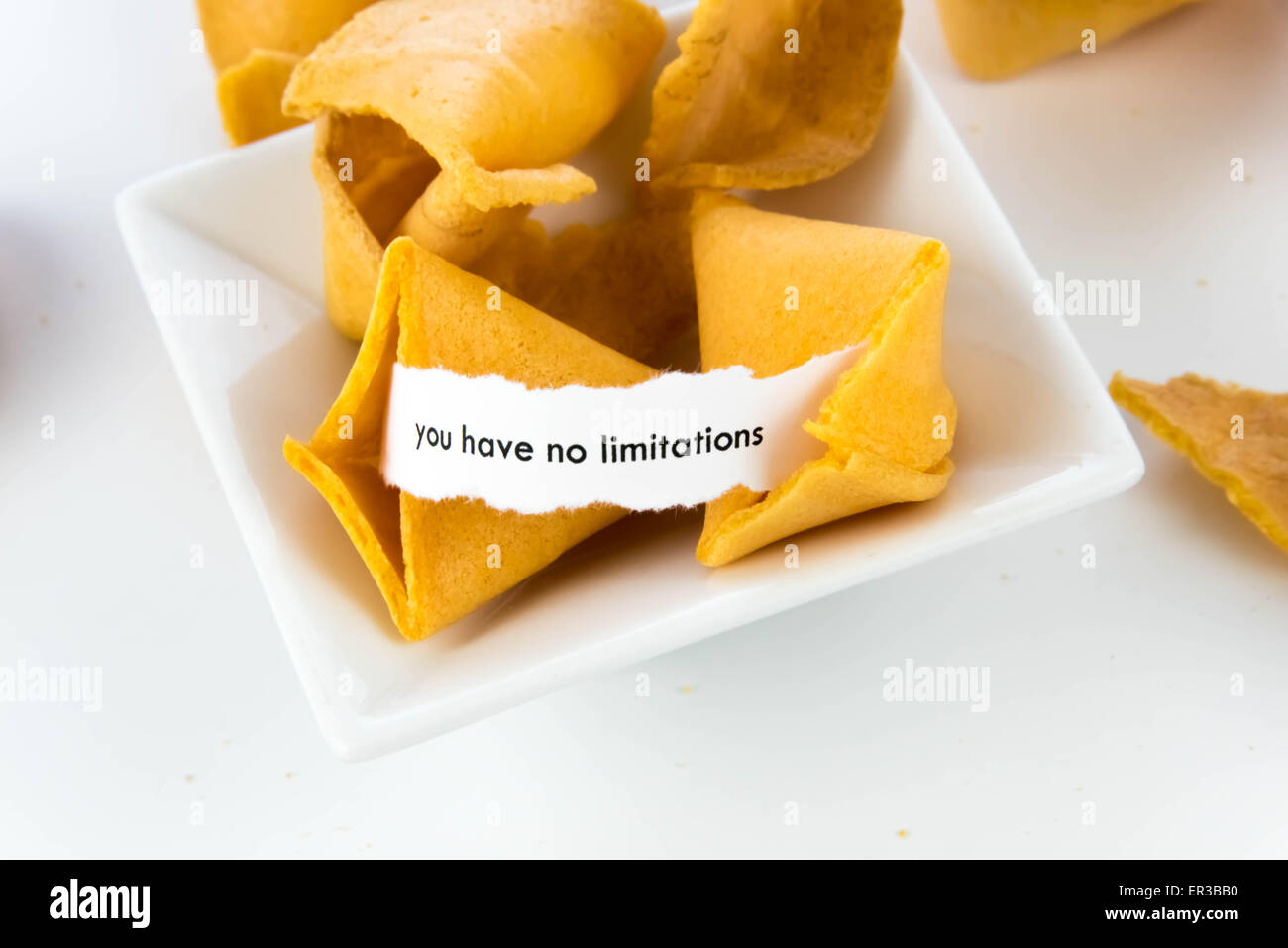 open fortune cookie with strip of white paper - YOU HAVE NO LIMITATIONS ...