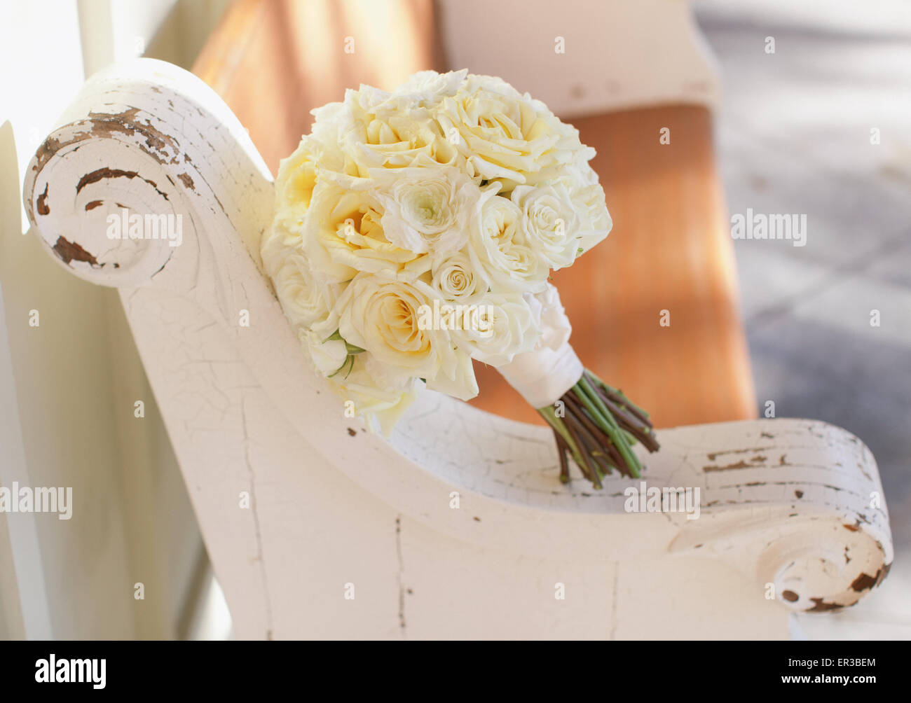 Wedding bouquet on a wooden bench Stock Photo